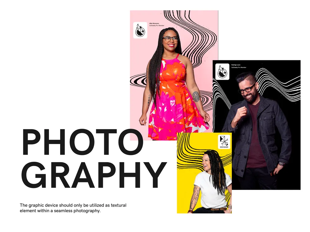Brand guideline page headed PHOTOGRAPHY, showing three GoDaddy Pro member portraits on pink, black, and yellow backgrounds with the flowing line graphic device layered behind each subject, and a note that the device should only be used as a textural element within the photography.